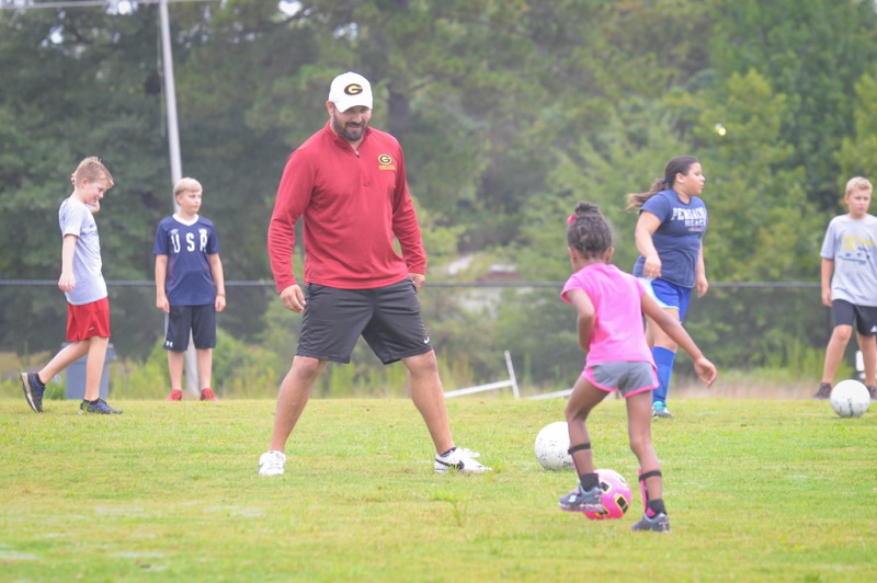 Coach Playing